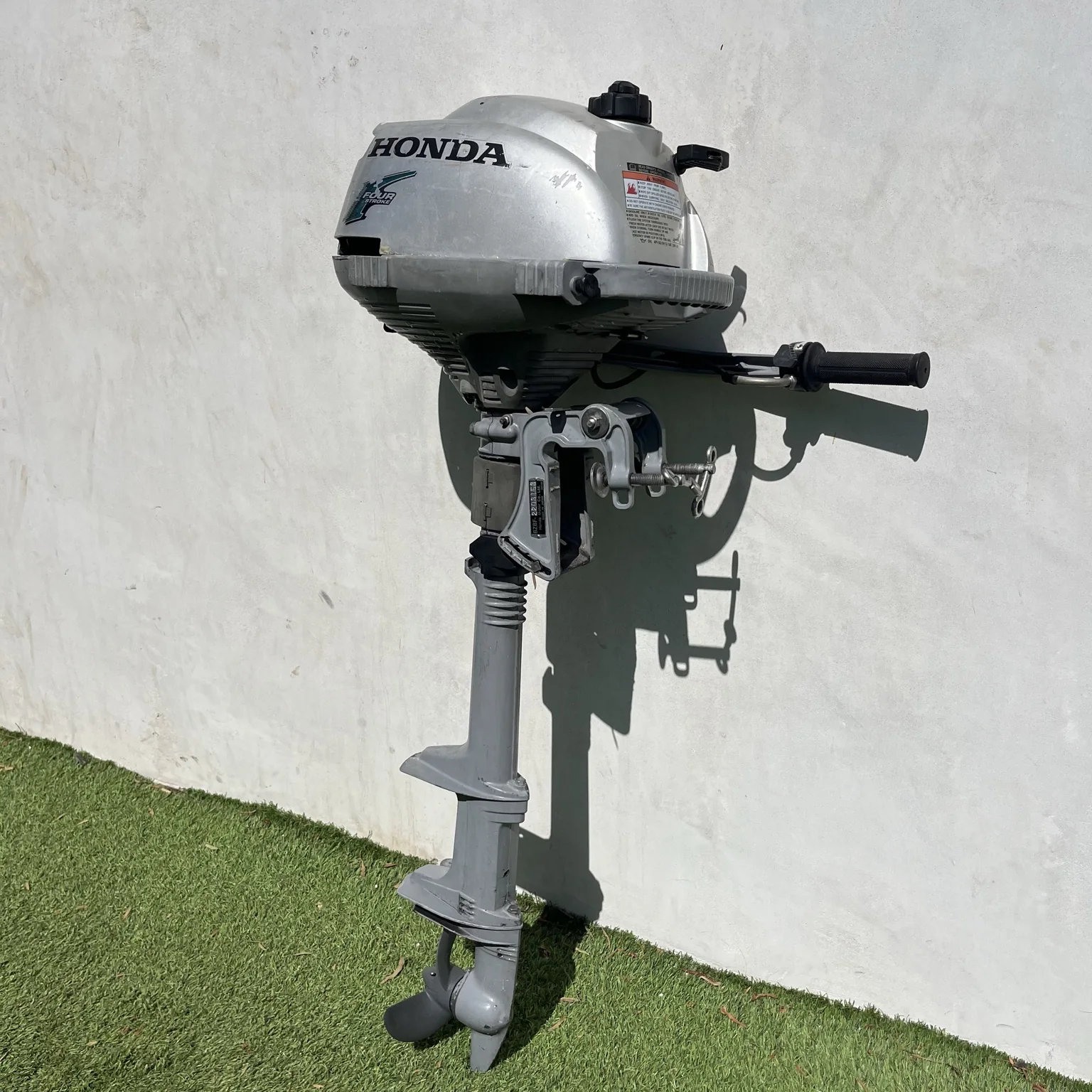 Honda 2 HP outboard rear and opposite side view