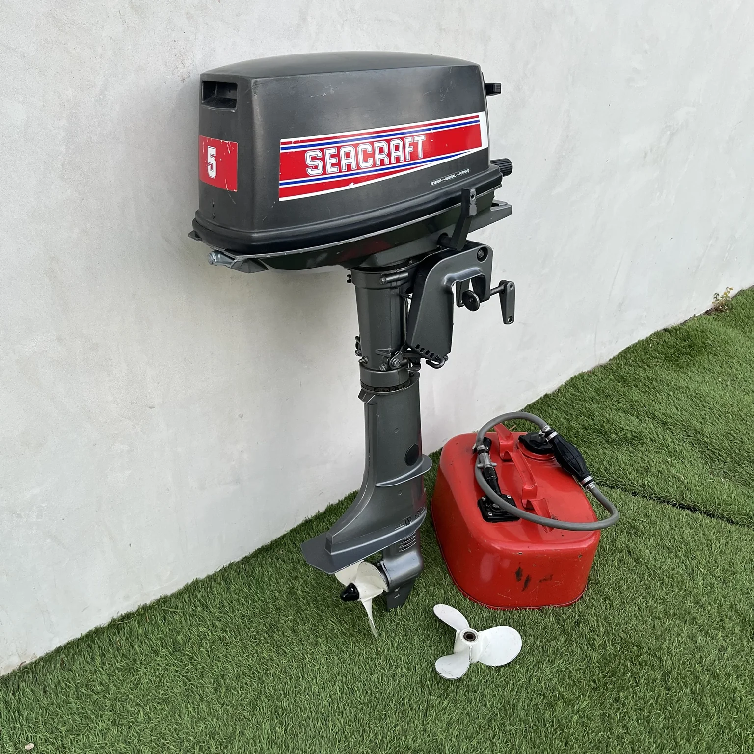 Seacraft 5 HP outboard opposite side